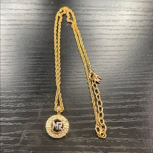 Nina Ricci Gold Necklace with Silver Pendant